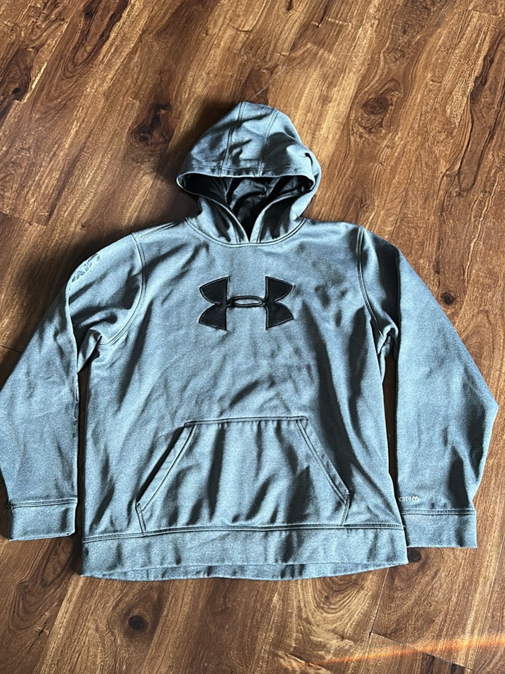 Under Armour youth Medium Heather Gray Hooded Pullover with Black Logo